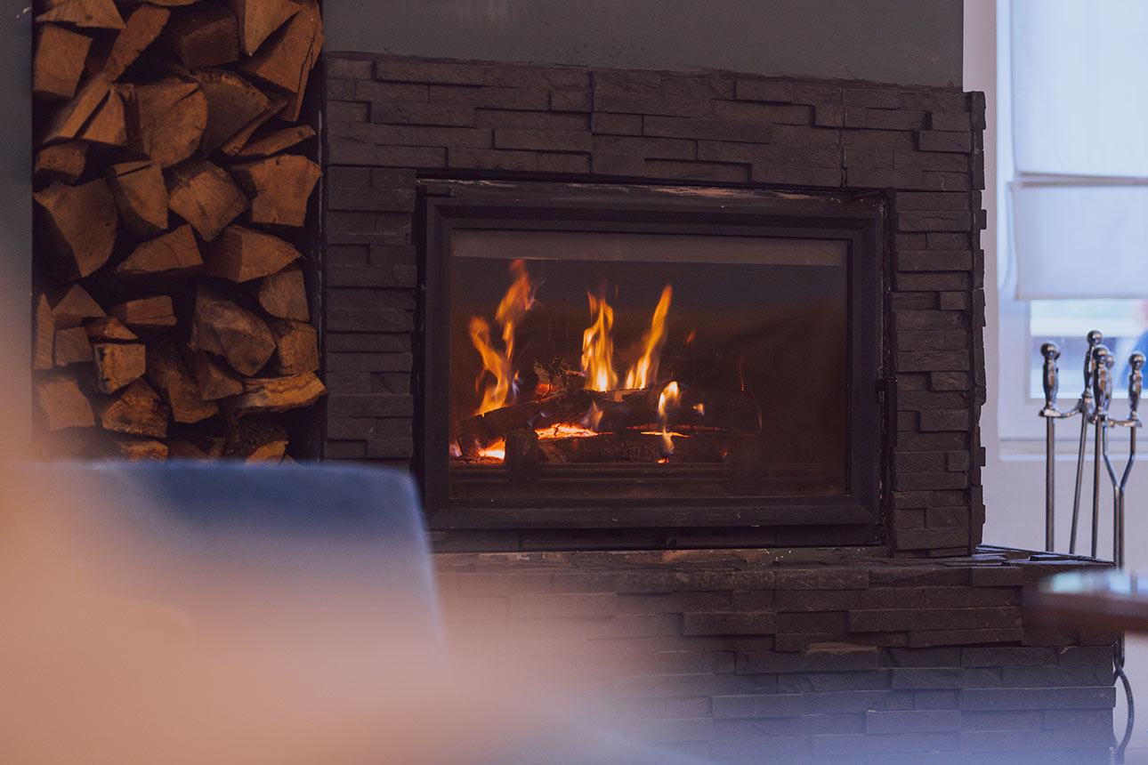Fireplace insert with stone cladding